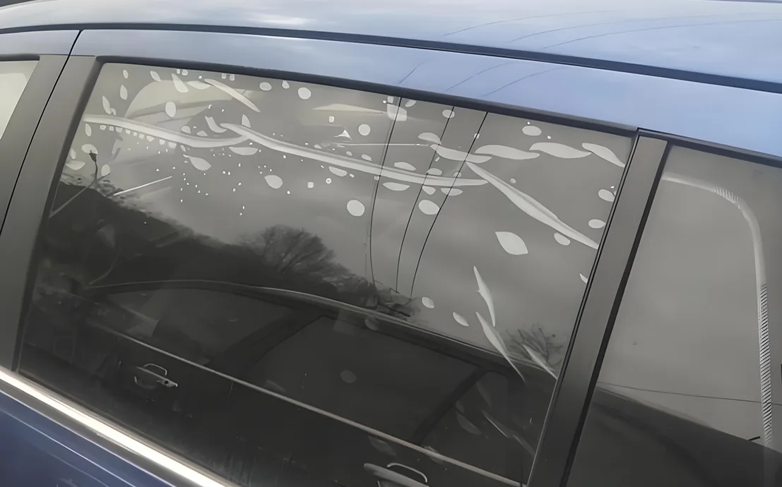 A bubbling window film on car door glass need to be removed.