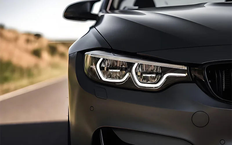 A BMW's headlight had been restored. It was like brand new.