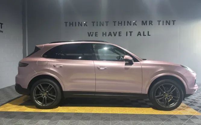 Porsche SUV got passion pink wrapped by Mr Tint