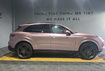 Porsche SUV got passion pink wrapped by Mr Tint