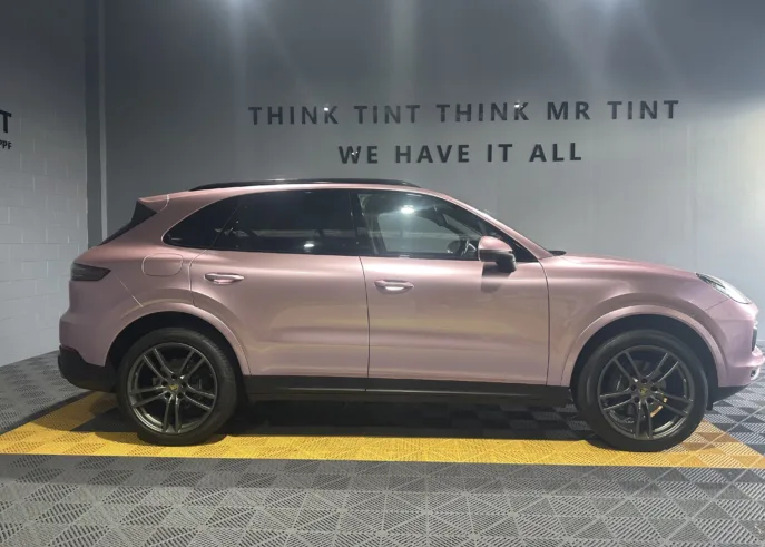 Porsche SUV got passion pink wrapped by Mr Tint